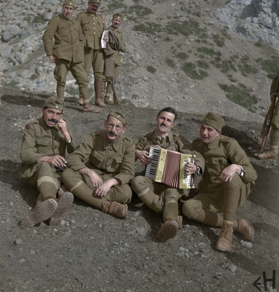 greek soldier resting with acordeon